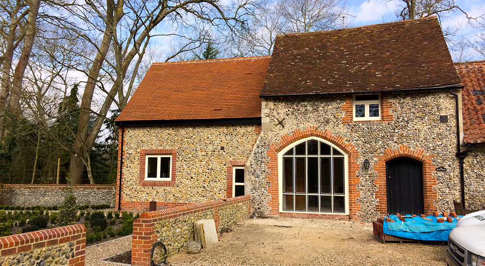 Extension and restoration to listed coachhouse in Rushford, Norfolk
